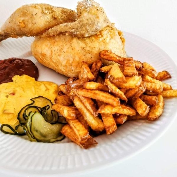Half grilled chicken with French fries