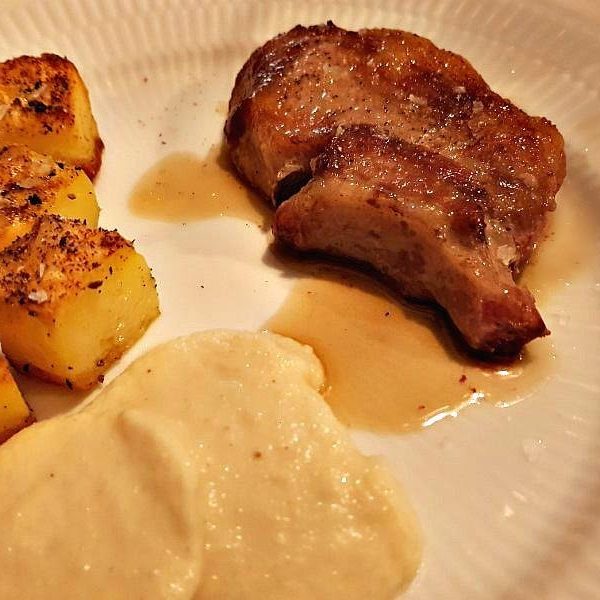 Iberico pork tenderloin with crispy potatoes, celeriac puree, and browned butter