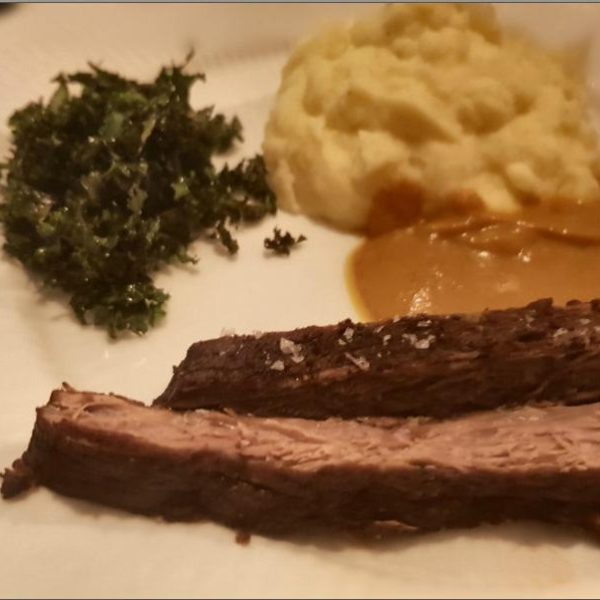 Braised brisket with mashed potatoes and crispy kale