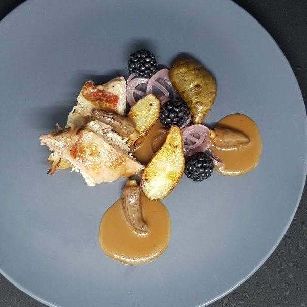 Oven-roasted pheasant with Jerusalem artichokes, blackberries, and morel sauce