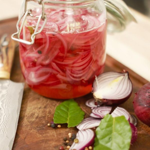 Pickled red onions in slices