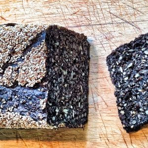 Traditional Danish rye bread sliced on cutting board