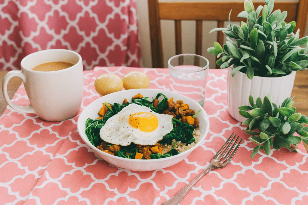 Breakfast Bowl with eggs, spinach, sweet potato, quinoa