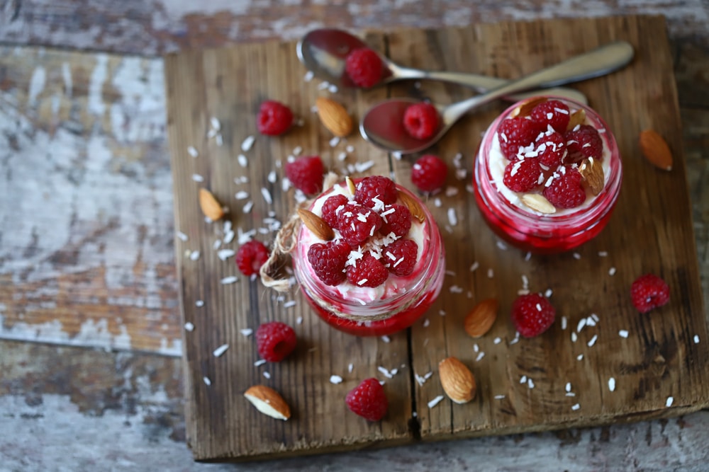 Selective,Focus.,Coconut,Yogurt,With,Raspberries,And,Raspberry,Jam.,Healthy