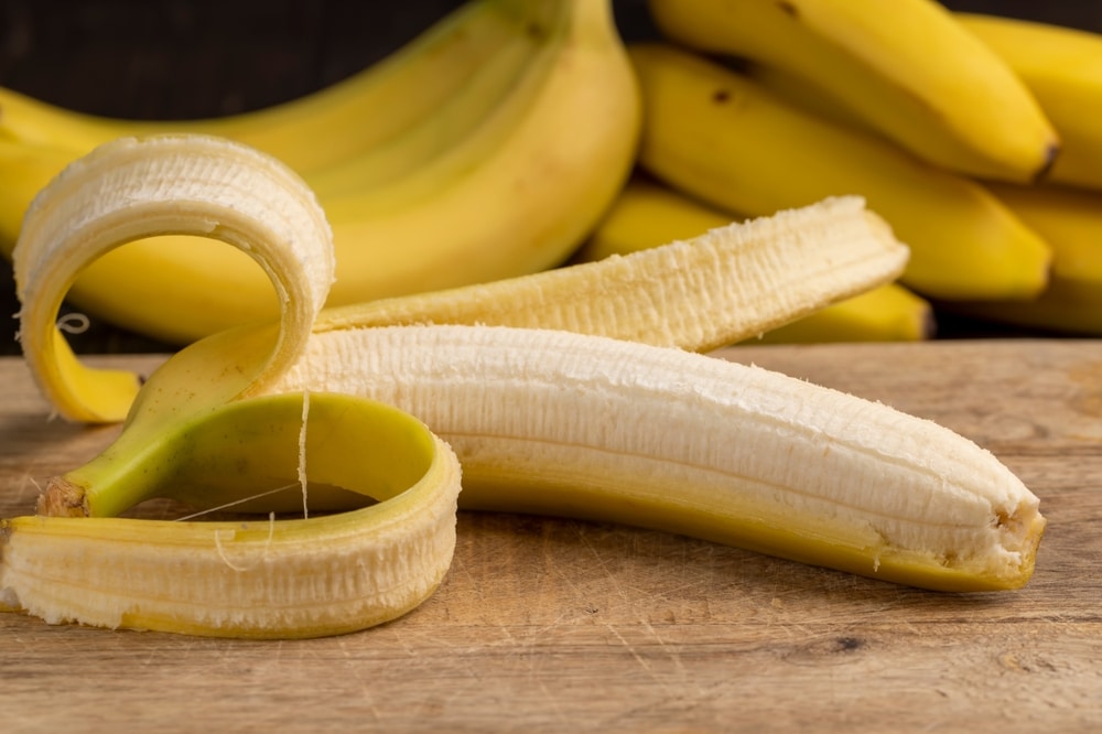 An,Open,Banana,Lies,On,The,Table,,,Ripe,Yellow