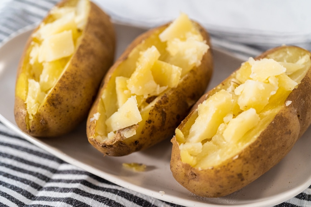 Pressure,Cooker,Baked,Potatoes.,Sliced,Cooked,Whole,Potatoes,On,A