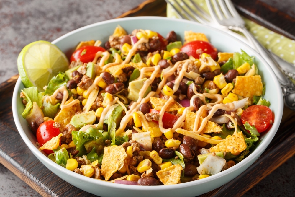 Beef,Taco,Salad,Made,With,Beans,,Corn,,Nacho,Chips,,Lettuce,