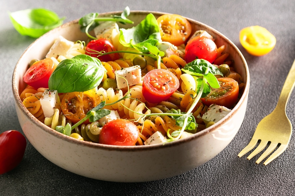 Colorful,Full,Grain,Fusilli,Pasta,Warm,Salad,With,Feta,Cheese,