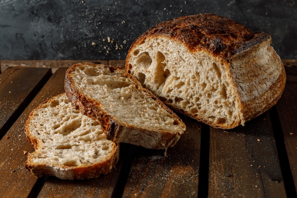 Freshly,Baked,Sourdough,Bread,Is,Beautifully,Sliced,And,Artfully,Displayed