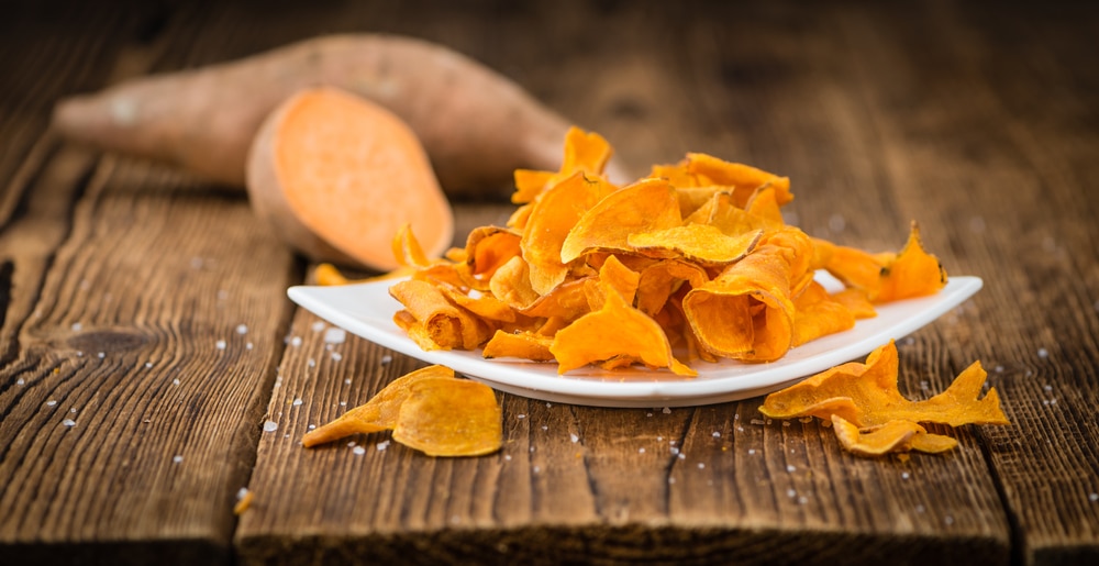 Sweet,Potato,Chips,On,A,Vintage,Background,As,Detailed,Close-up