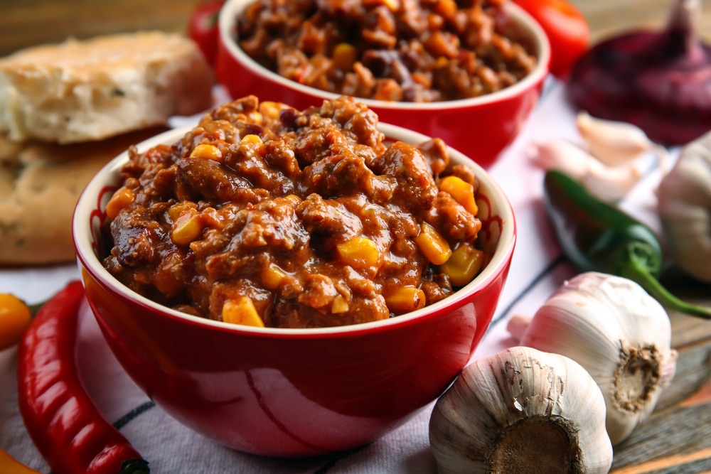 Composition,With,Chili,Con,Carne,In,Bowls,On,Table