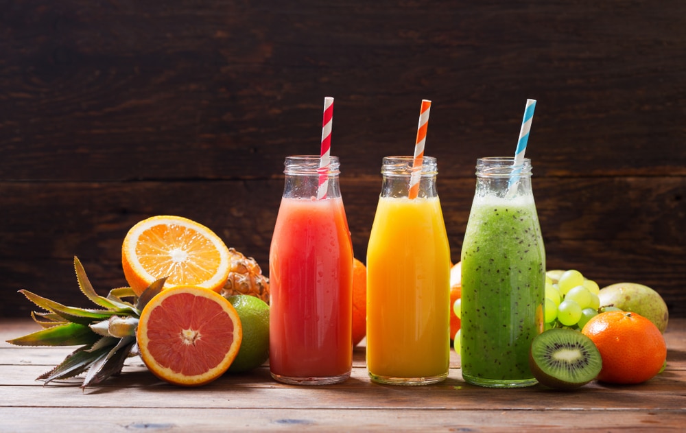 Bottles,Of,Fruit,Juice,And,Smoothie,With,Fresh,Fruits,On