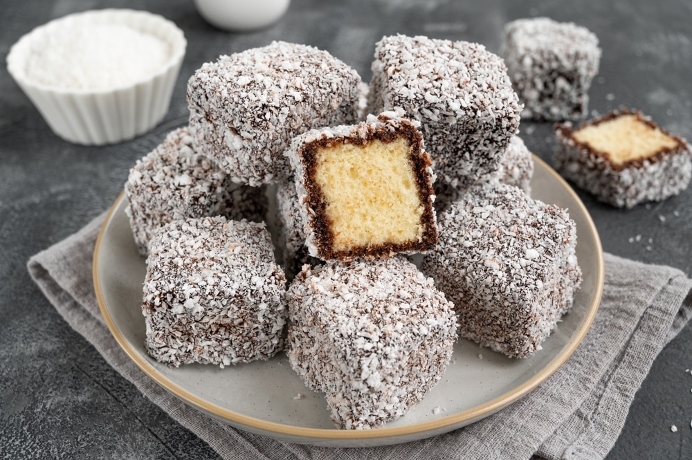 Traditional,Australian,Lamington,Cake,In,Chocolate,Glaze,And,Coconut,Flakes