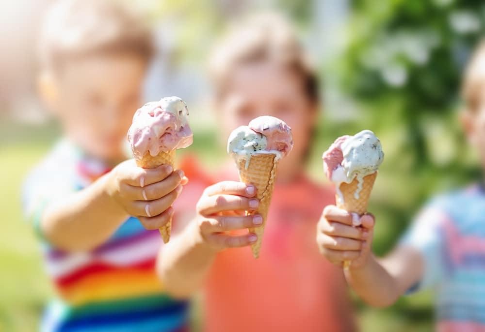 Group,Of,Children,In,The,Park,Eating,Cold,Ice,Cream.