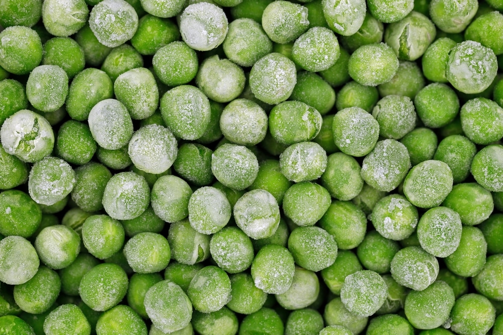 Close,Up,Of,Frozen,Green,Peas,,Top,View,Of,Vegetable