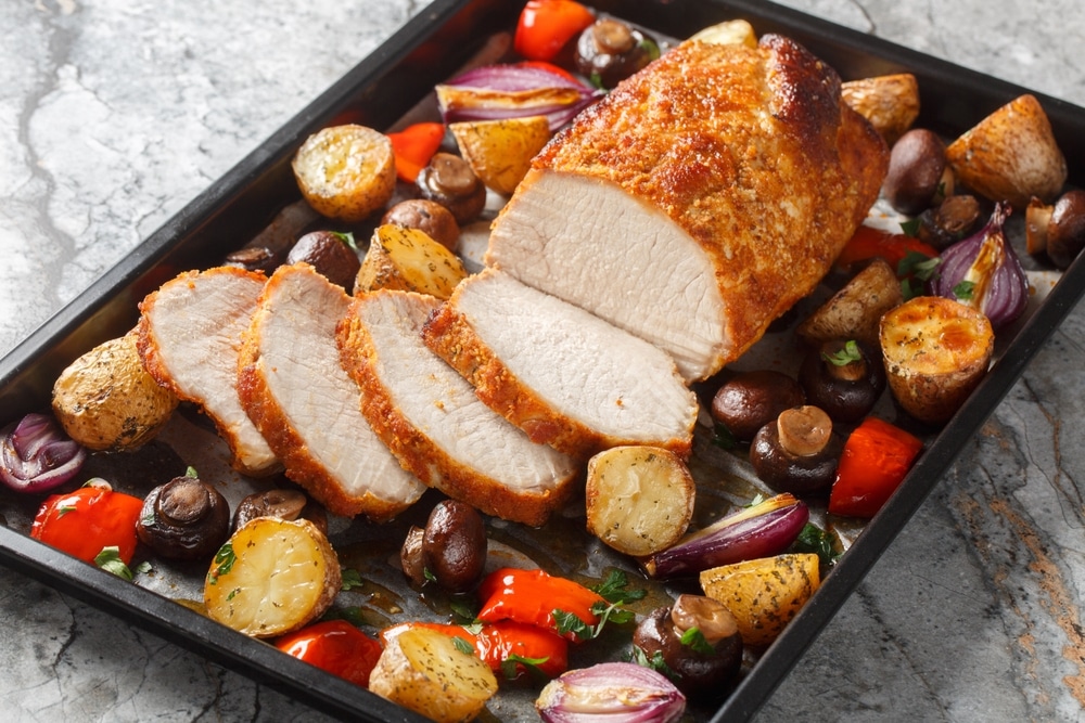 Honey,Baked,Pork,Loin,With,Potatoes,,Onions,,Bell,Peppers,And