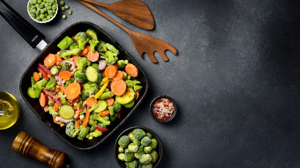 Mixed,Frozen,Vegetables,In,A,Pan,,Ready,To,Cook.,Close-up.