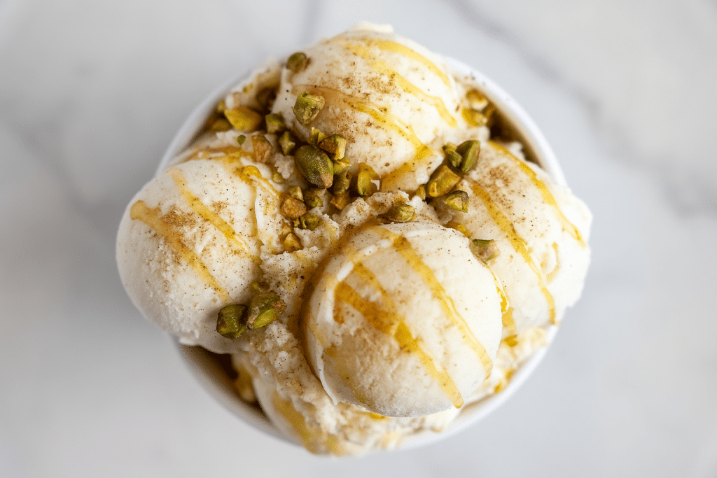 Vanilla Ice Cream with chopped pistachio, honey and cardemom