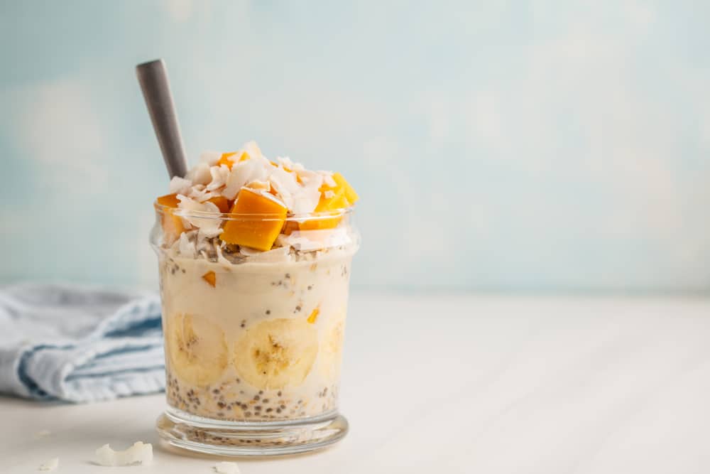 Overnight,Oatmeal,With,Mango,,Coconut,,Banana,And,Chia,Seeds.,Clean