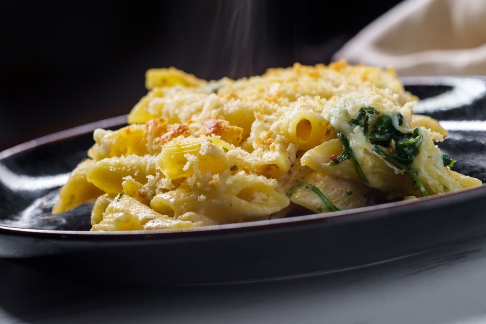 Creamy,Baked,Chicken,Alfredo,With,Penne,Pasta,Topped,With,Parmesan