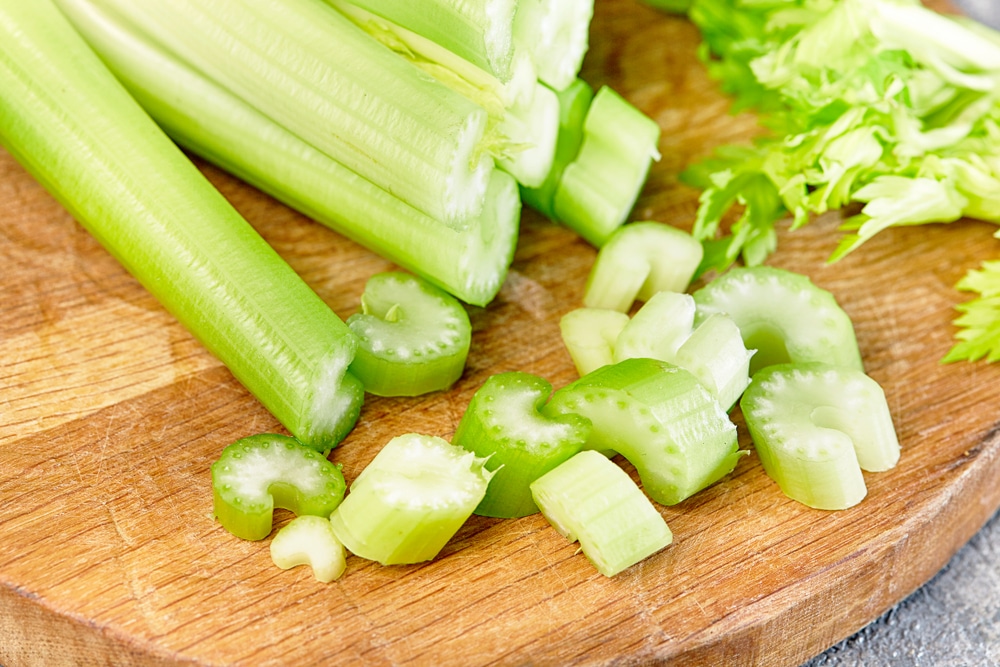 Fresh,Selery,On,Wooden,Chopping,Board.,Close,Up.