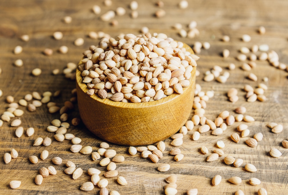 Mahlab,Seeds,On,Wooden,Background.,Aromatic,Spice,Made,From,The