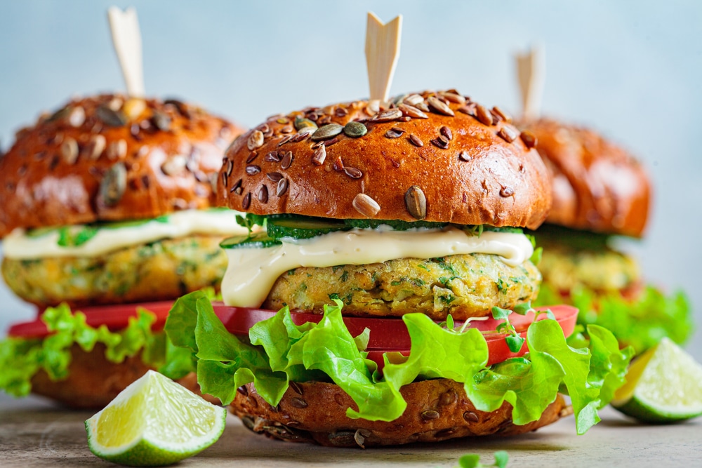 Vegan,Falafel,Burger,With,Vegetables,And,Sauce,,Dark,Background.,Healthy
