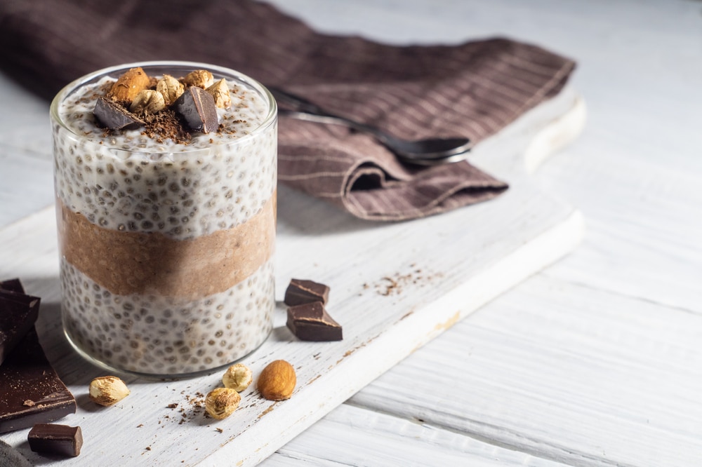 Chia,Pudding,With,Cocoa,,Chocolate,And,Nuts,In,Almond,Milk.