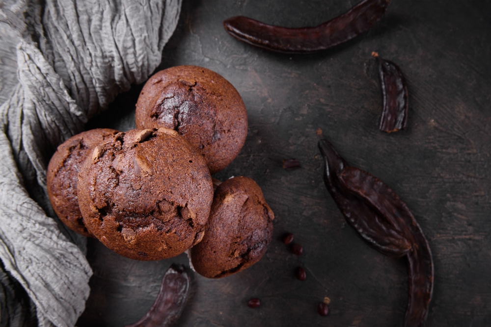 Chocolate,Carob,Cupcakes,Cooking,With,Carob,Powder,And,Dried,Carob