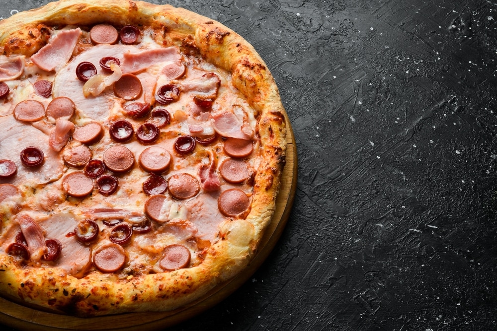 Pizza,With,Sausages,,Bacon,And,Cheese.,Classic,Pizza,On,A