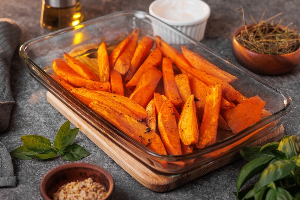 Appetizing,Sweet,Potatoes,,Cut,Into,Slices,,Baked,In,The,Oven