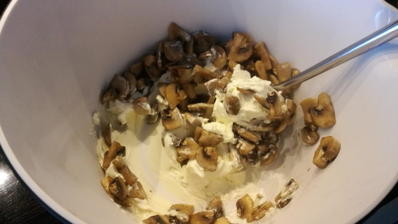 Cream cheese and mushrooms in a bowl