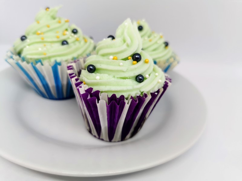 Dark cupcakes with frosting