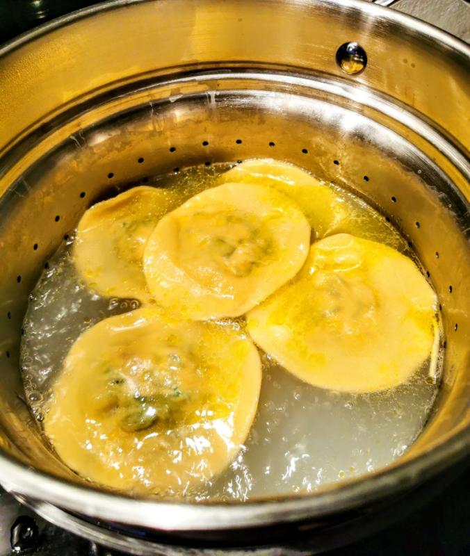 Ravioli with duck, ricotta, and spinach