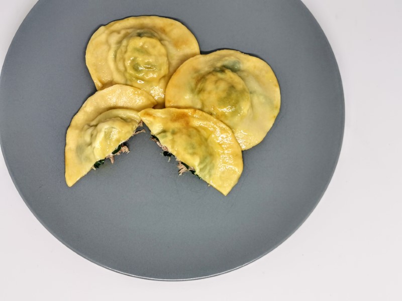 Ravioli with duck, ricotta, and spinach