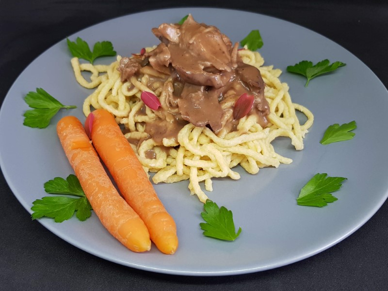 Spätzle with braised turkey leg